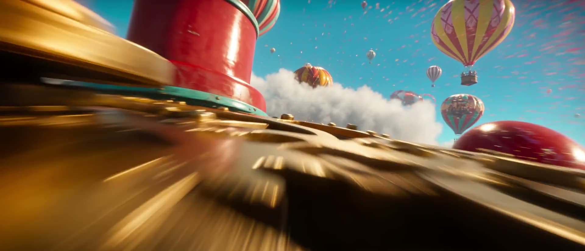 Frame de abertura do filme Carnival in the Sky — um céu de amanhecer com grade de cor que estabelece a linguagem visual antes do circo aparecer